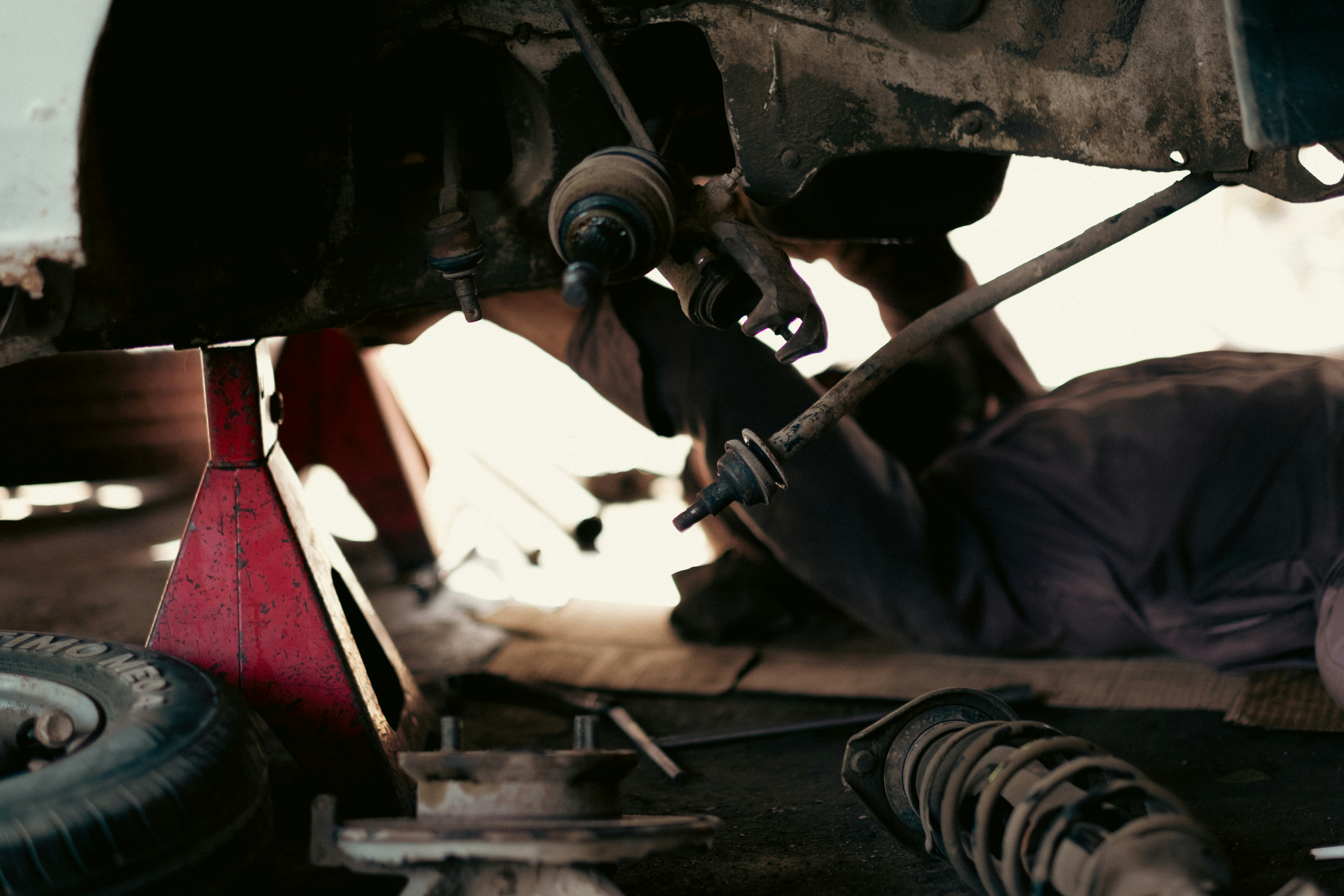 Expert mechanic working on a car engine